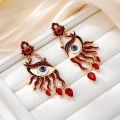 A Fashionable and Creative Red Devil's Eye Red Earrings. 