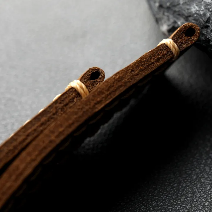 High-end%20genuine%20leather%20watchband,%20available%20in%20sizes%2020MM,%2022MM,%2024MM,%20and%2026MM,%20featuring%20a%20double-folded%20brown%20design,%20vinta%20-%20Image%204