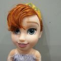 (B). Disney Frozen Snow Glow Elsa Doll Sings "Let it Go" Lights Up 13". 