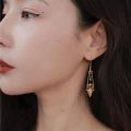 Punk style glossy copper inlaid zircon cone long earrings for women fashion new in charms earings banquet jewelry.