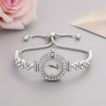 1 piece of elegant women's quartz watch, paired with luxurious rhinestone embellishment - gold simulated bracelet.