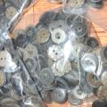 2-hole plastic buttons 100-piece packet. 