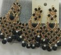 khuden earrings and tikka set. 