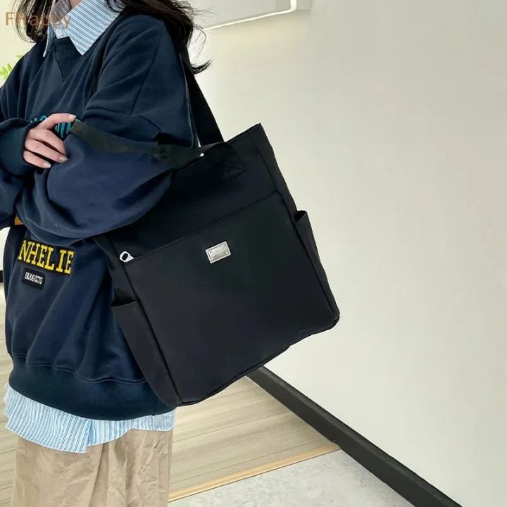 Lightweight and Waterproof Shoulder Bag Large Capacity Handbag Suitable for Work Study and Travelling Bag