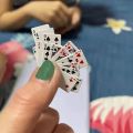 Mini playing card game. 