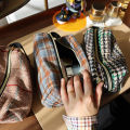 Plaid woolen cosmetic bag multifunctional portable large storage bag small fresh portable three-dimensional toiletry bag.