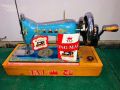 TAJ SEWING MACHINE REGD # 578733. 