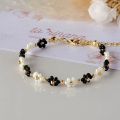 Flower beaded bracelet pack of one with ring. 