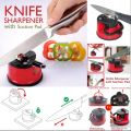 Knife sharpener with suction pad. 