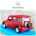 Mercedes Benz G Wagon Maroon 1/41 Scale (4.5 in) with Pull Back Action by Maisto. 