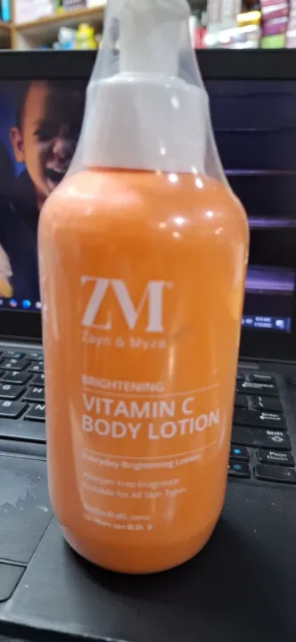 ZM%0A%0A%20Zayn%20&%20Myza%0A%0A%20BRIGHTENING%0A%0A%20VITAMIN%20C%20BODY%20LOTION%0A%0A%20Everyday%20Brightening%20Lotion%0A%0A%20Allergen%20Free%20Fragrance%20Suitable%20for%20All%20Skin%20Types%0A%0A%20Vitamin%20C%20Body%20Lotion%20Meet%20Quantity:%20250ml.%20%20b%20-%20Image%205