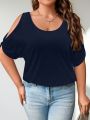 Plus Size Cold Shoulder T-Shirt for Women Casual Loose Fit Summer Top with Trendy Cutouts.