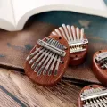 8 Key Mini Wooden Kalimba High Quality Exquisite Finger Thumb Piano Marimba Musical Good Accessory Pendant Gift. 