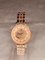 Fashionable Rose Gold Dial And Strap Watch For Women. 