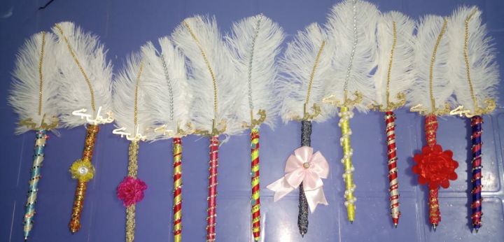nikha pen white feather