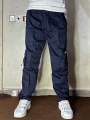 Baggy cargo trousers for men - lightweight fabric - dark blue colour. 