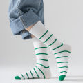 Children's socks in three pairs, spring and autumn style, simple and versatile, green striped socks for boys and girls. 