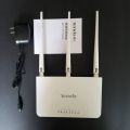 Techin used Tenda F3 Wifi Router Branded 300Mbps English Language with wifi extender option. 