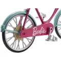 Barbie bicycle with basket of flowers. 