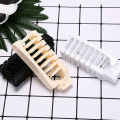 Mini plastic folding hair brush compact pocket size travel comb convenience.