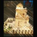 handmade ice cream stick house with fairy lights. 