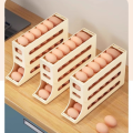 Slide Egg Storage Box Refrigerator Side Door Storage Box Automatic Scrolling Egg Holder Tray 4 Layer Rolling Egg Dispenser Rack-The Asia Express. 