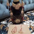 Bridal Jewellery set in Red and Golden colour with beautiful Crystal mala, bindeya and jhumer. 