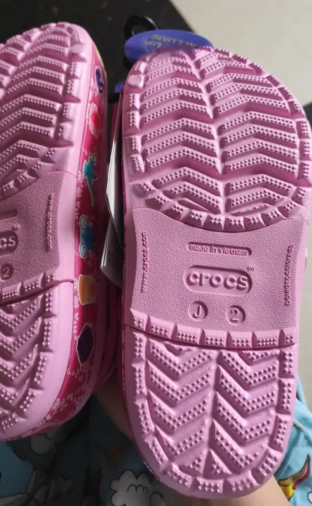 Crocs%20kids'%20shoe%20%20Fun%20with%20Colorful%20Comfort%20-%20Step%20into%20Adventures%20with%20Playful%20Crocs%20for%20Happy%20Little%20Feet%20-%20Image%204