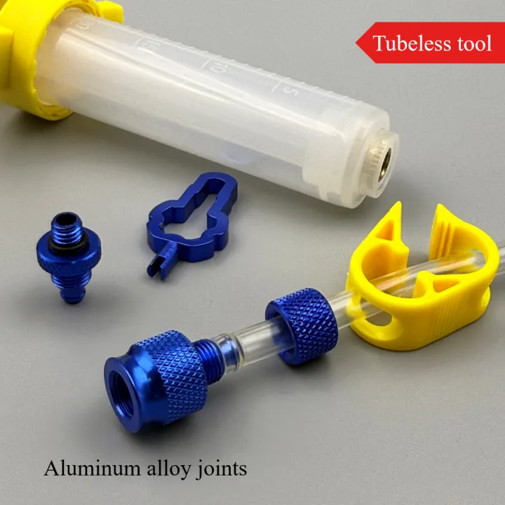 1Set%20Bicycle%20Tubeless%20Tire%20Sealant%20Injector%20Repair%20Tool%20with%204-in-1%20Nozzle%20Wrench%20for%20Schrader%20&%20Presta,%20Aluminum%20Alloy%20Joints%20-%20Image%204