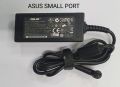 ASUS laptop AC adapter, commonly known as a charger. . 