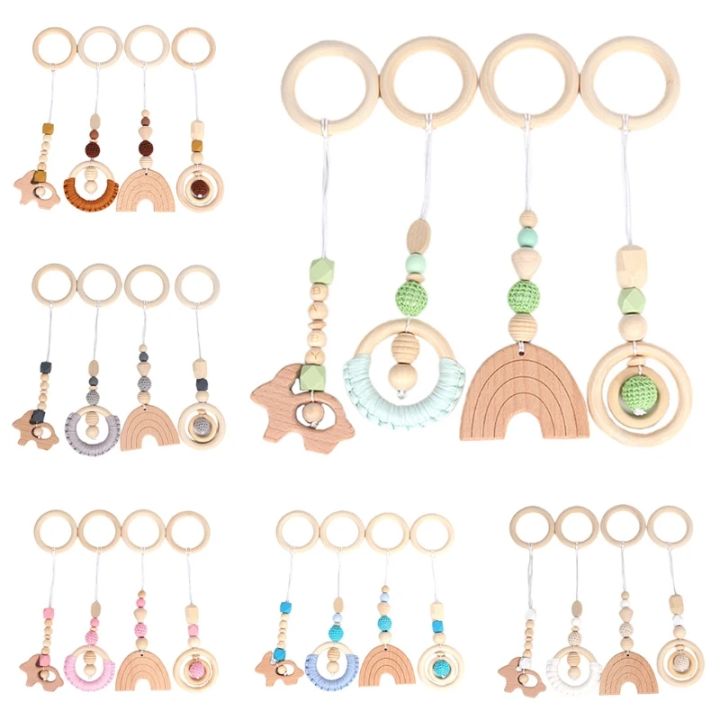 4%20Pcs/Set%20Baby%20Teething%20Nursing%20Rattle%20%20Play%20Gym%20Frame%20Stroller%20Hanging%20Pendants%20Wooden%20Ring%20Teether%20Molar%20-%20Image%206