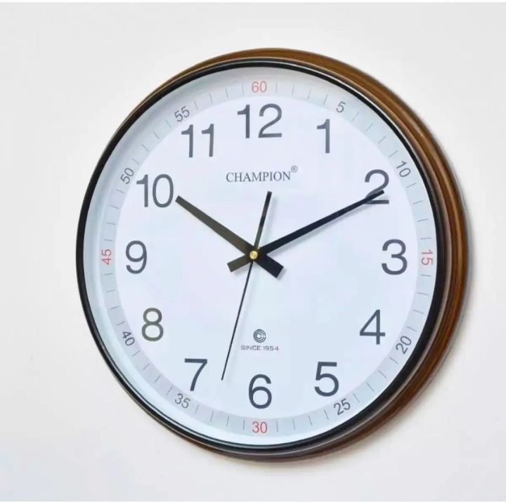 Champion wall clock 13 inches. Brown wall clock.Ticking motion clock.Original Toshiba battery included 🔋