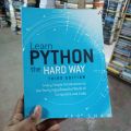 Learn Python the Hard Way: A Very Simple Introduction to the Terrifyingly Beautiful World of Computers and Code

Book by Zed Shaw. 