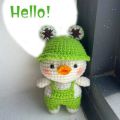Crochet cute duck bag charm or keychain with a dress and hat. 