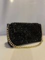 Black Pearl bag with chain or  handle. 