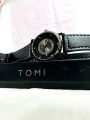 Tomi watches. 