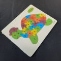 Wooden English Alphabet Jigsaw puzzle for kids. 