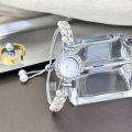 Double-Row Pearl Pull-Open Bracelet Diamond-Encrusted Case Arabic Numeral Scale Ladies Quartz Watch. 