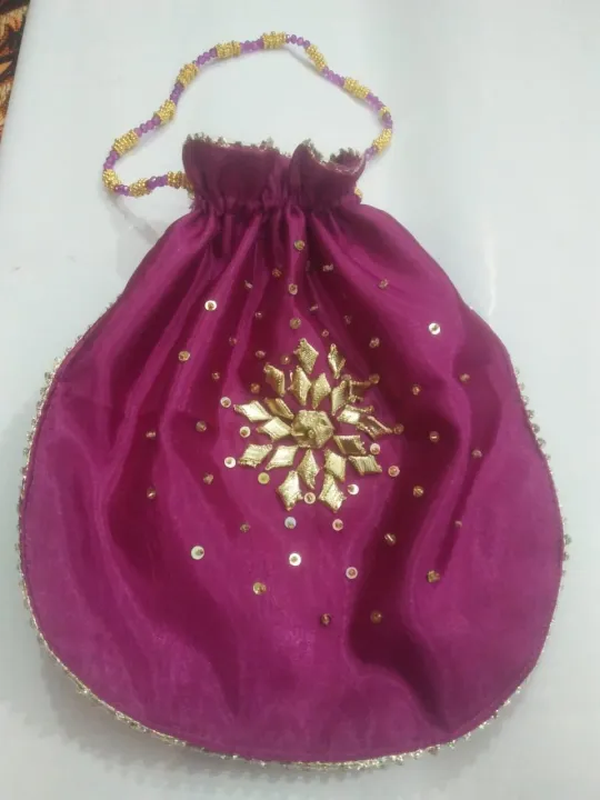 ORANGLES Fancy embroidered clutch/potli bag for wedding parties designer traditional potli gol bag with Handmade Gota work - detailed closeup view - illustrating benefits - Image 3 of 3 | created for all | Shop Fancy embroidered clutch/potli bag for wedding parties designer traditional potli gol bag with Handmade Gota work North Carolina | Free Shipping ORANGLES