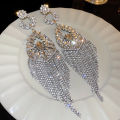 Exaggerated Rhinestone Flower Drop Earrings for Women Personality Hollow Long Earrings Fashion European and American Jewelry. 