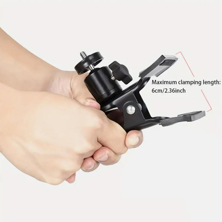 Universal%20metal%20phone/tablet%20stand%20clip,%20suitable%20for%20desktop/table/art%20easel,%20convenient%20for%20live%20streaming,%20video%20calls%20-%20Image%202