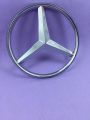 Mercedes monogram logo, emblem, trademark, sign, mark, symbol, stamp, monogram, motif, badge, design, shield or figure. 
