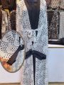 black dot abaya for girls white comfertable fabric. 