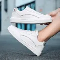 2023 Spring and Autumn Women's Campus Little White Shoes Fashion Trend Board Sneakers. 