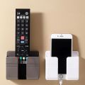Multifunction Punch Free Wall Mounted Storage Box Organizer TV Remote Control Mounted Mobile Phone Plug Charging Holder 1pics.