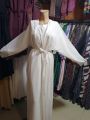 White abaya with different styles. 