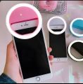 - Rechargeable 3 Modes Selfie Ring Light (Mix/Random color) ). 
