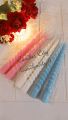 TWO LONG SPIRAL TAPER CANDLE IN PASTEL COLOURS (20 cm Tall). 