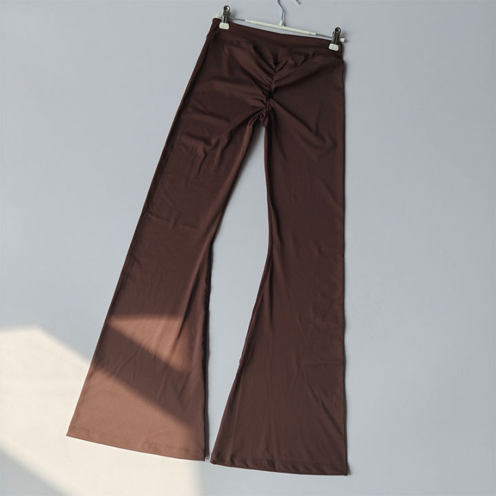 Women's%20Cross%20Waist%20Flare%20Pants%20-%20Booty%20Lifting%20Yoga%20Tights%20with%20Ruffle%20Detail,%20Quick%20Dry%20Wide%20Leg%20for%20Fall%20Workouts%20-%20Image%204