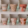 painted clay plant pot. 